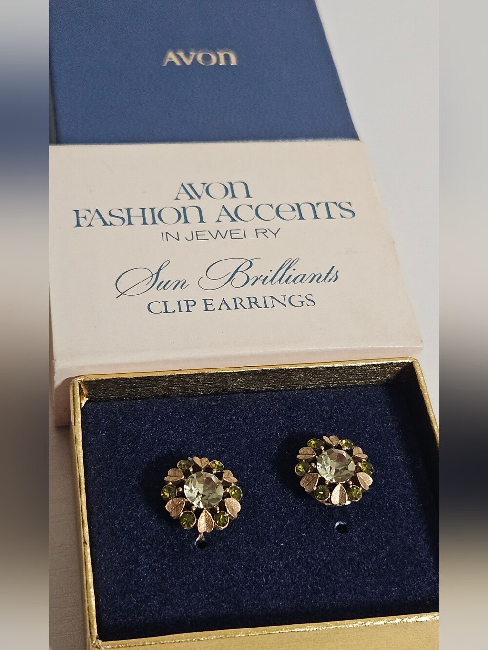 Avon Gold-Tone Floral Stud Earrings with Green and Clear Stones (1974)